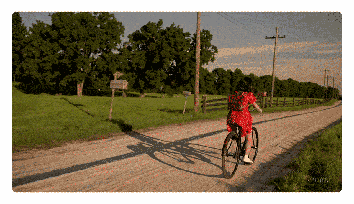Video of a girl riding a bicycle generated by OpenAI Sora according to the ChatGPT 4.1 prompt