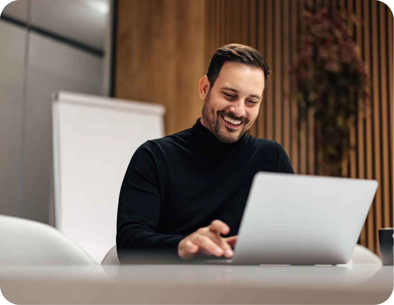 man looking laptop office