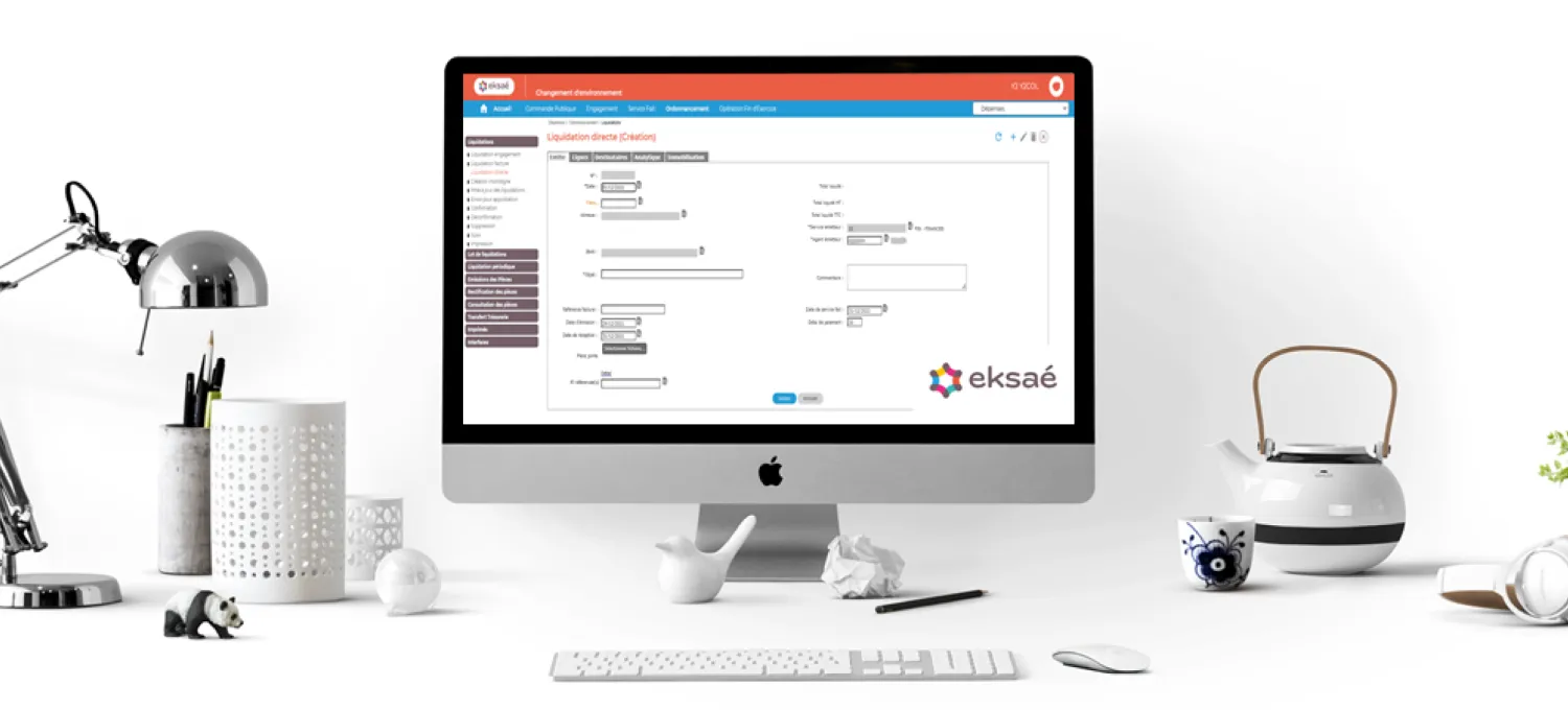 success story of eksae - white desk with an apple pc
