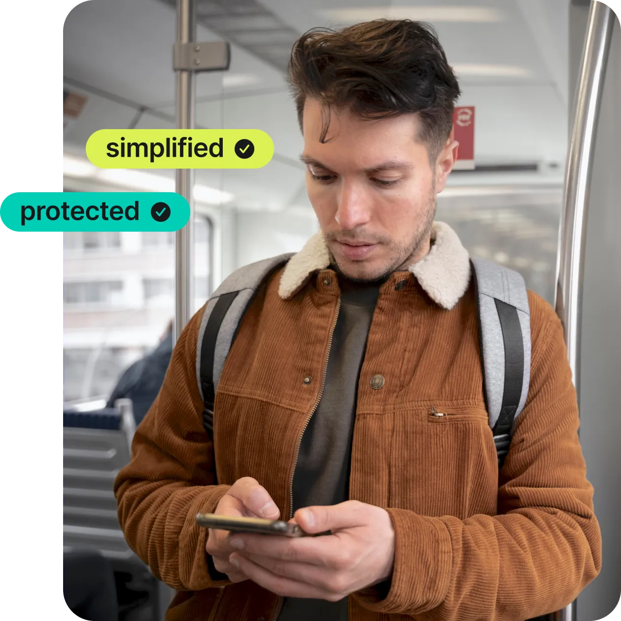 man on his phone in public transport using NordPass