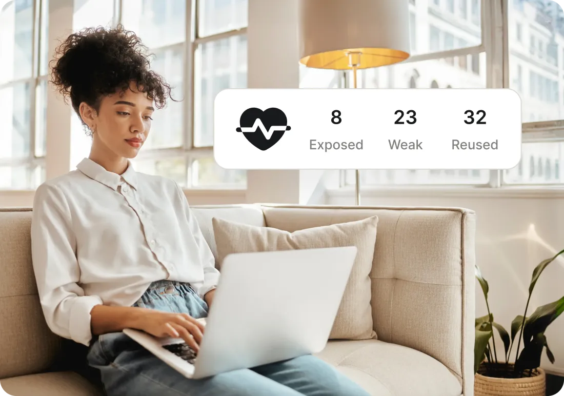 Woman checking NordPass password health statistics on laptop