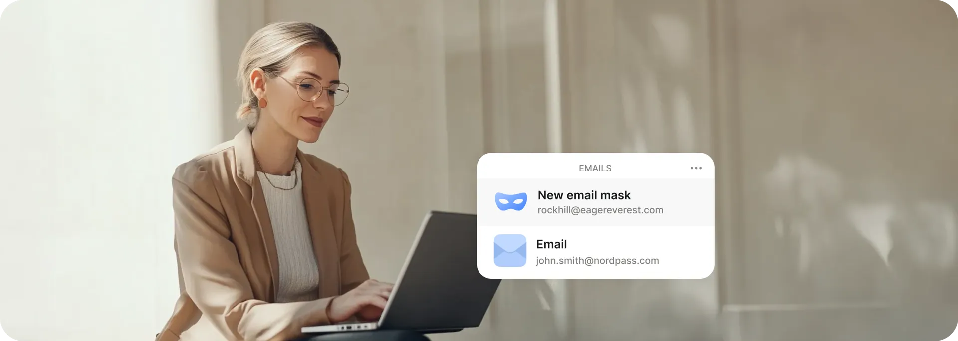 Woman with laptop using NordPass masked email functionality