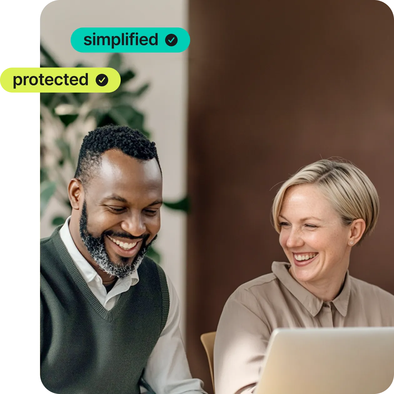 two people using nordpass on laptop